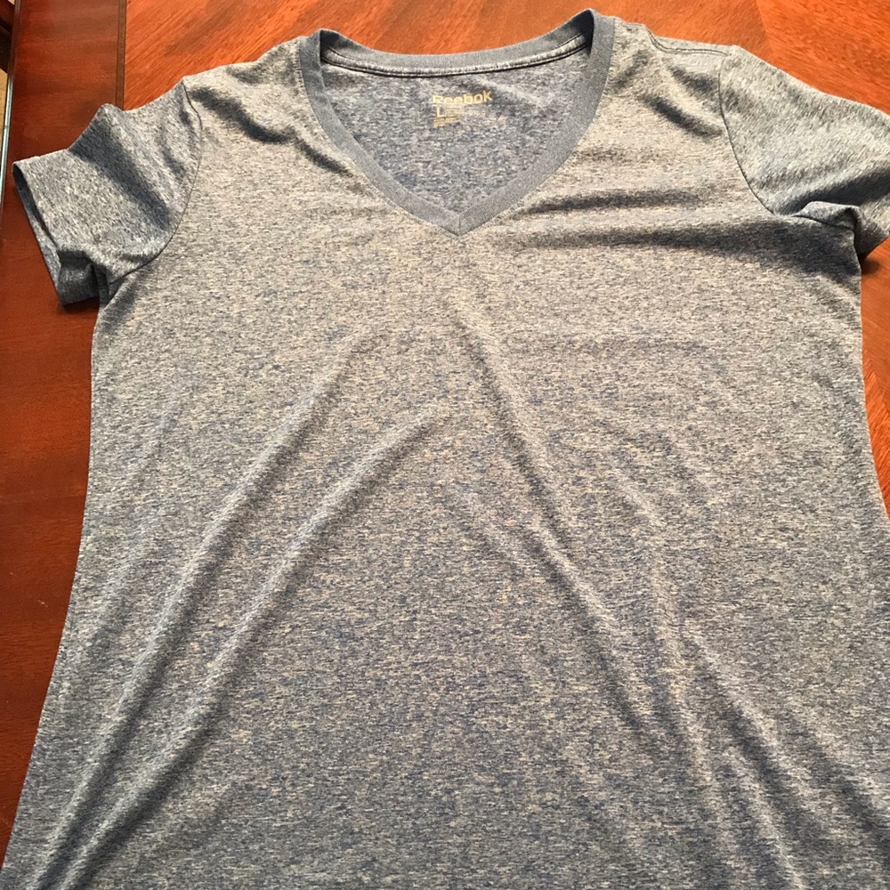 Women’s Reebok shirt.